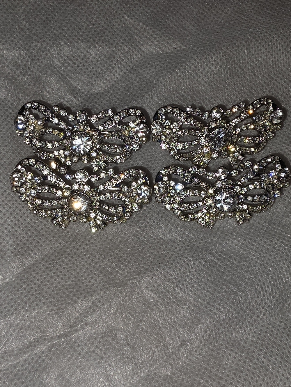VIntage, silver-tone crystal rhinestone brooch with an ornate bow or wing-like f - Picture 2 of 5